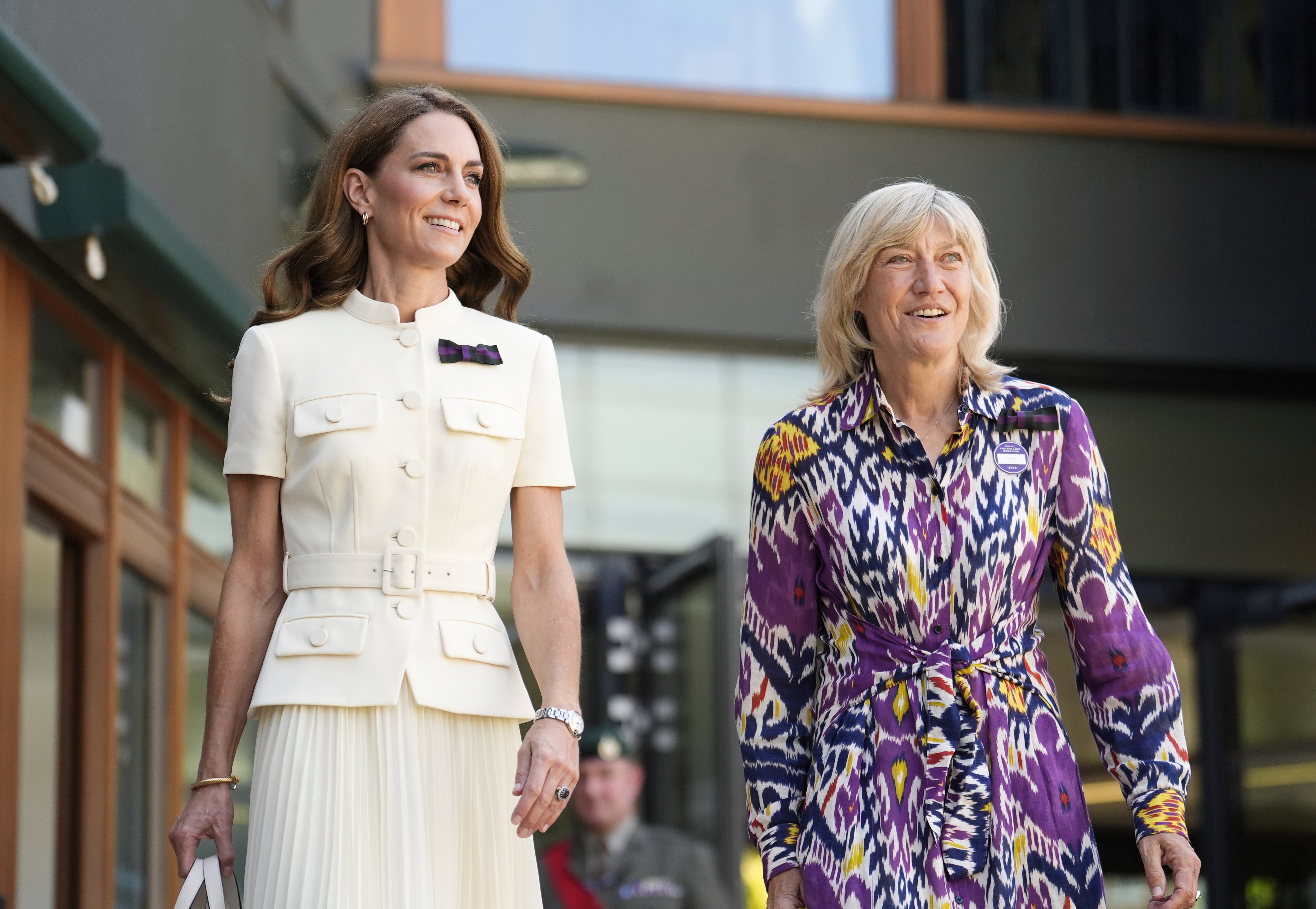 Britain's Kate, Princess of Wales, with AELTC chair Debbie Jevans, right, arrives to attend the women's singles final