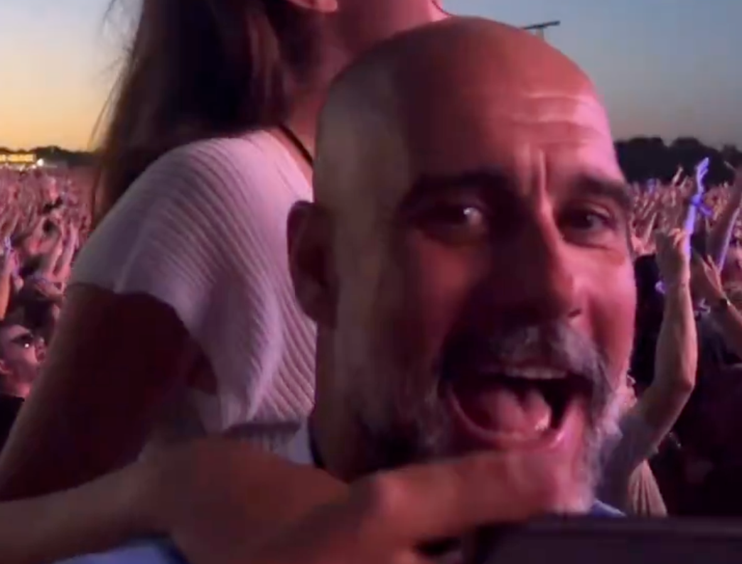 <p>Pep Guardiola at Oasis's homecoming gig in Manchester (11 July)</p>
