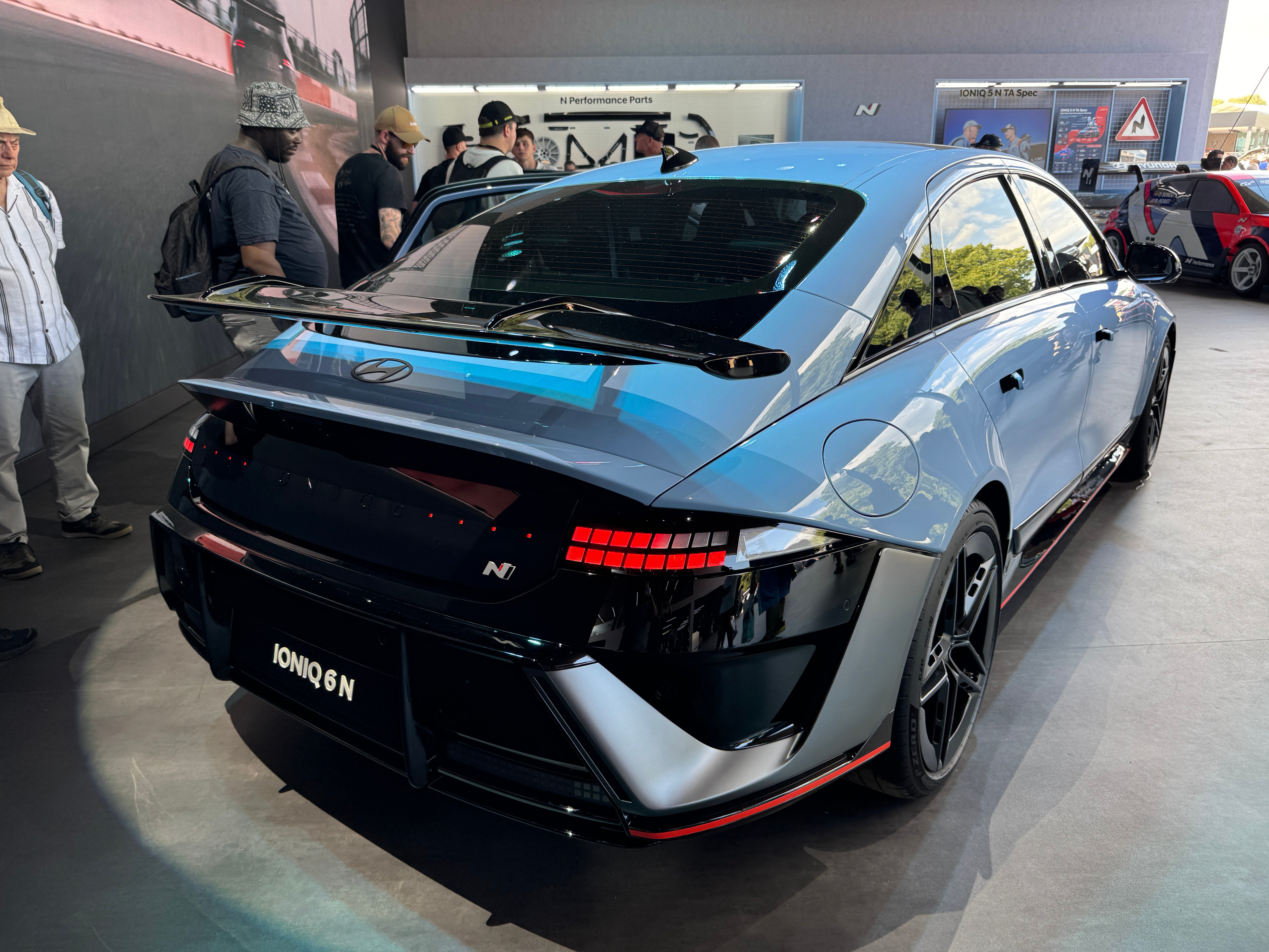 A new rear spoiler and dark paint treatment give the Hyundai Ioniq 6 N supercar style