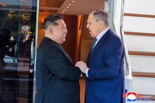 North Korean leader Kim Jong Un shakes hands with Russian Foreign Minister Sergei Lavrov during a meeting in Wonsan on Saturday