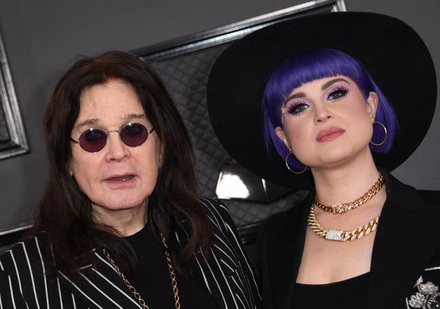 <p>Ozzy Osbourne and his daughter Kelly Osbourne arrive for the 62nd Annual Grammy Awards on January 26, 2020</p>