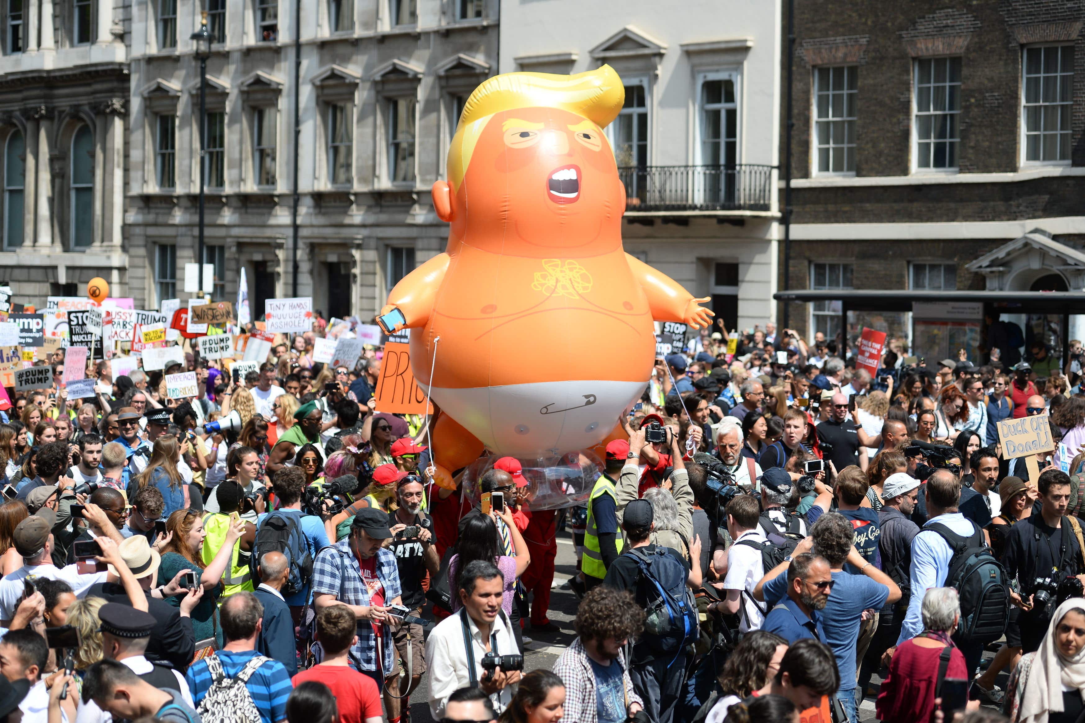 The ‘Trump Baby’ balloon joins demonstrators as they march to Parliament Square in 2018