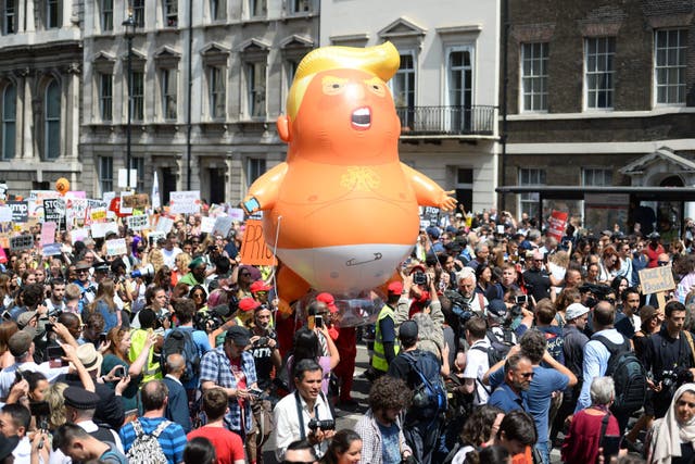 The ‘Trump Baby’ balloon joins demonstrators as they march to Parliament Square in 2018 (Kirsty O’Connor/PA)