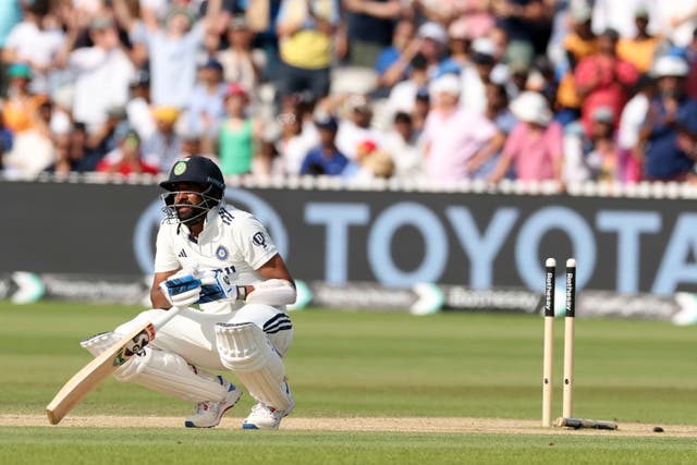<p>India's Mohammed Siraj reacts after losing his wicket during the fifth day of the third cricket test match between England and India at Lord's cricket ground in London</p>