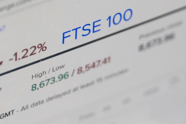 The FTSE 100 index closed up 56.94 points, 0.6%, at 8,998.06. It earlier hit a new all-time peak of 8,999.22 (Danny Lawson/PA)