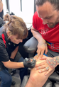 Lorraine Kelly swaps TV studio for tattoo parlour as she inks athlete