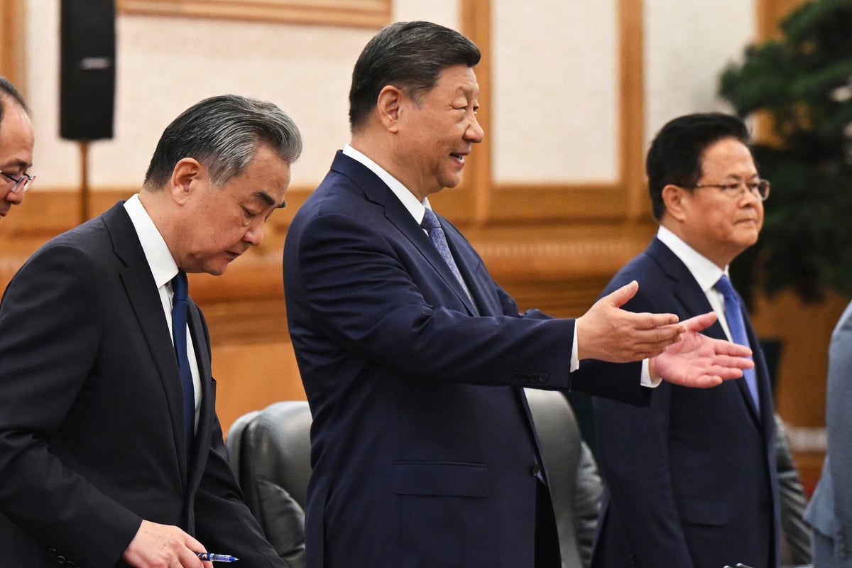 Australian and Chinese leaders seek to boost trade despite differences on other issues