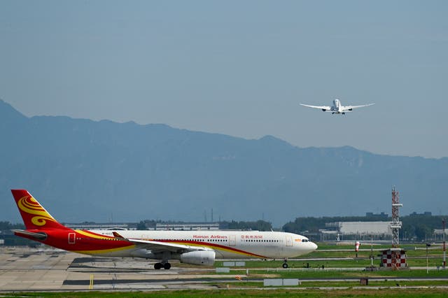 <p>Representative: An Air China Airbus 330-300 plane waits to take off at Beijing International airport on 6 July 2025</p>
