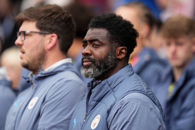 <p>Kolo Toure is now a permanent member of Pep Guardiola’s Man City staff</p>