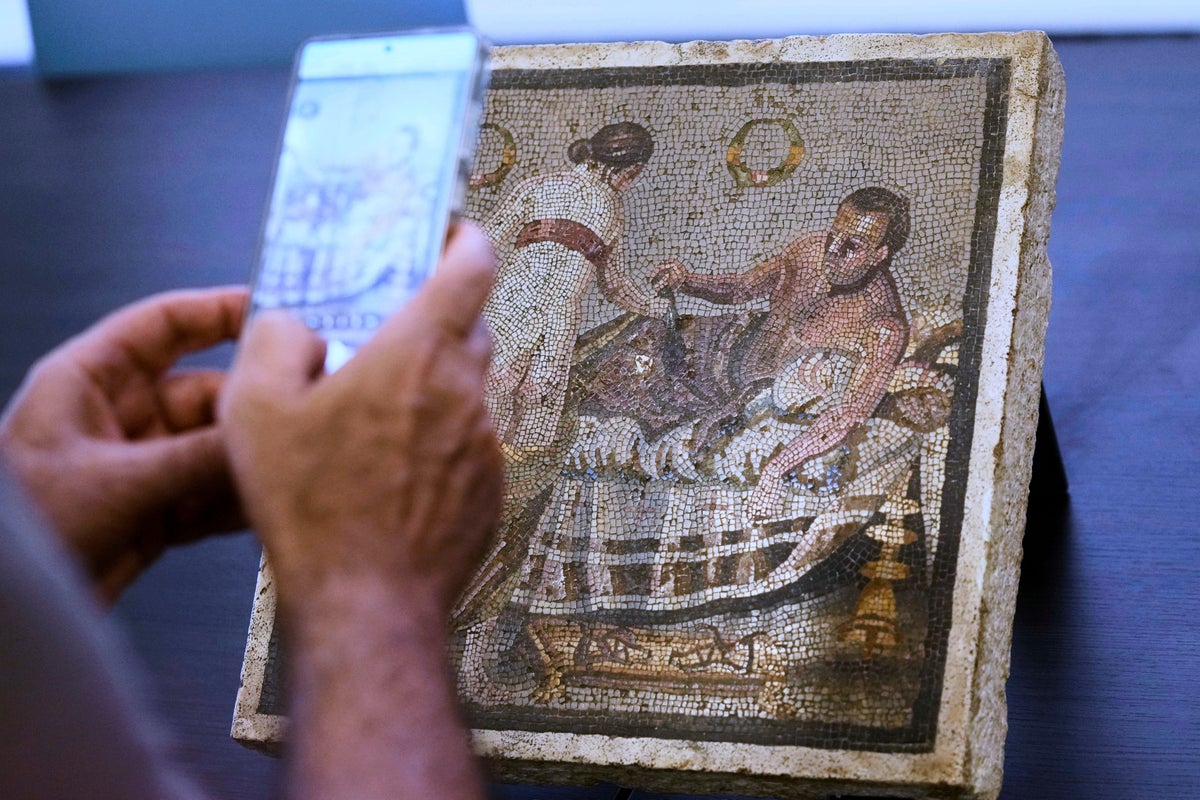 Erotic Roman mosaic stolen by Nazis during Second World War returns to Pompeii