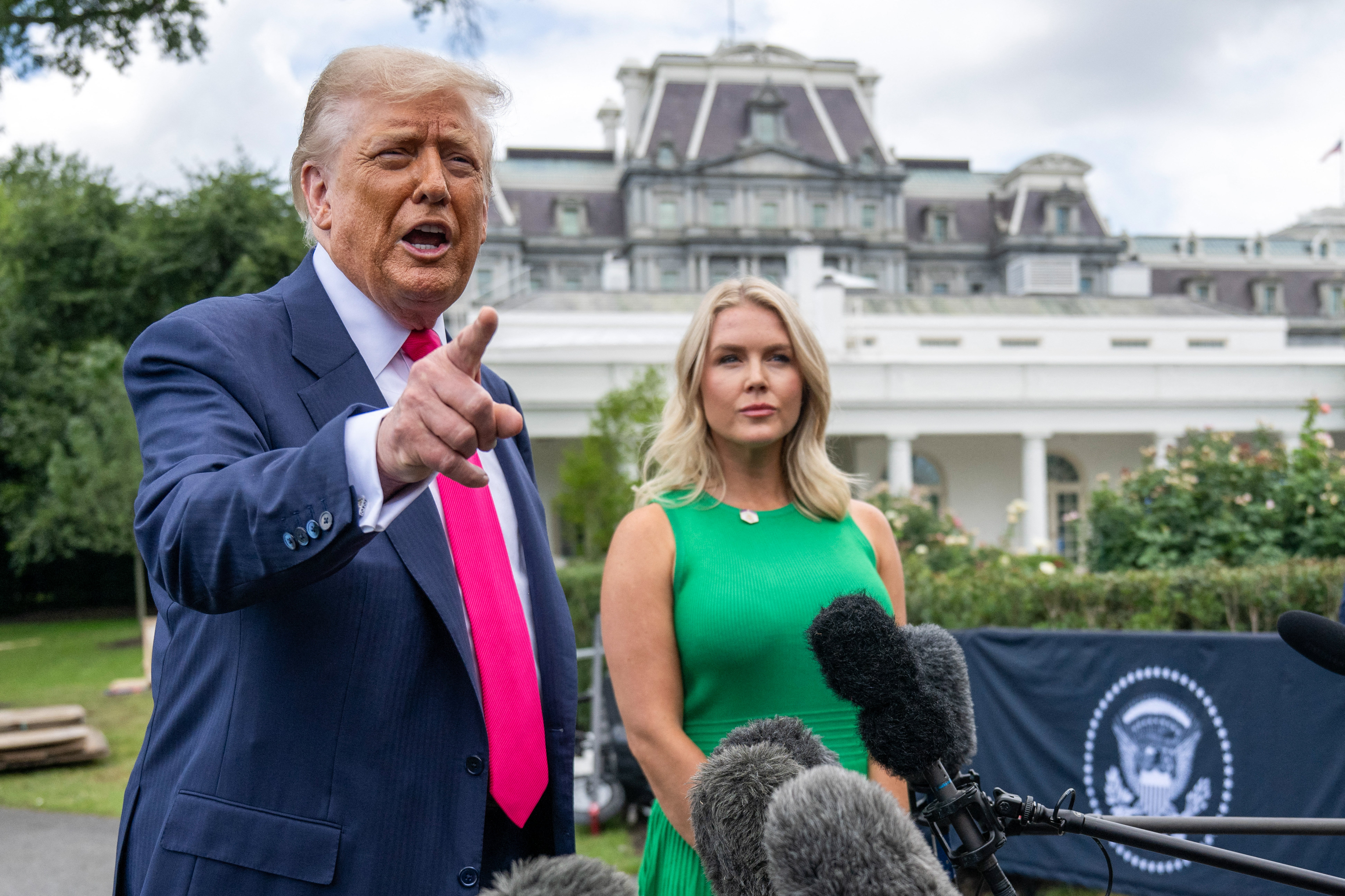President Donald Trump and Press Secretary Karoline Leavitt