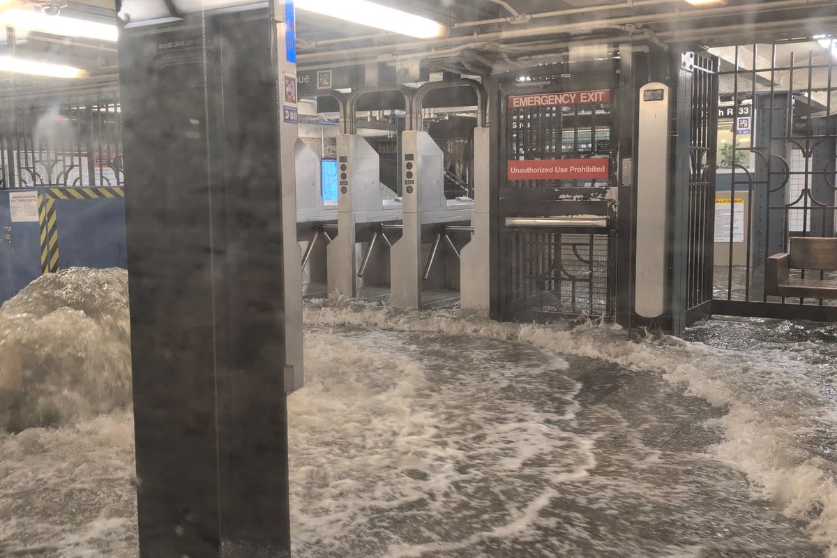 Flights grounded and subway stations under water as floods hit NYC