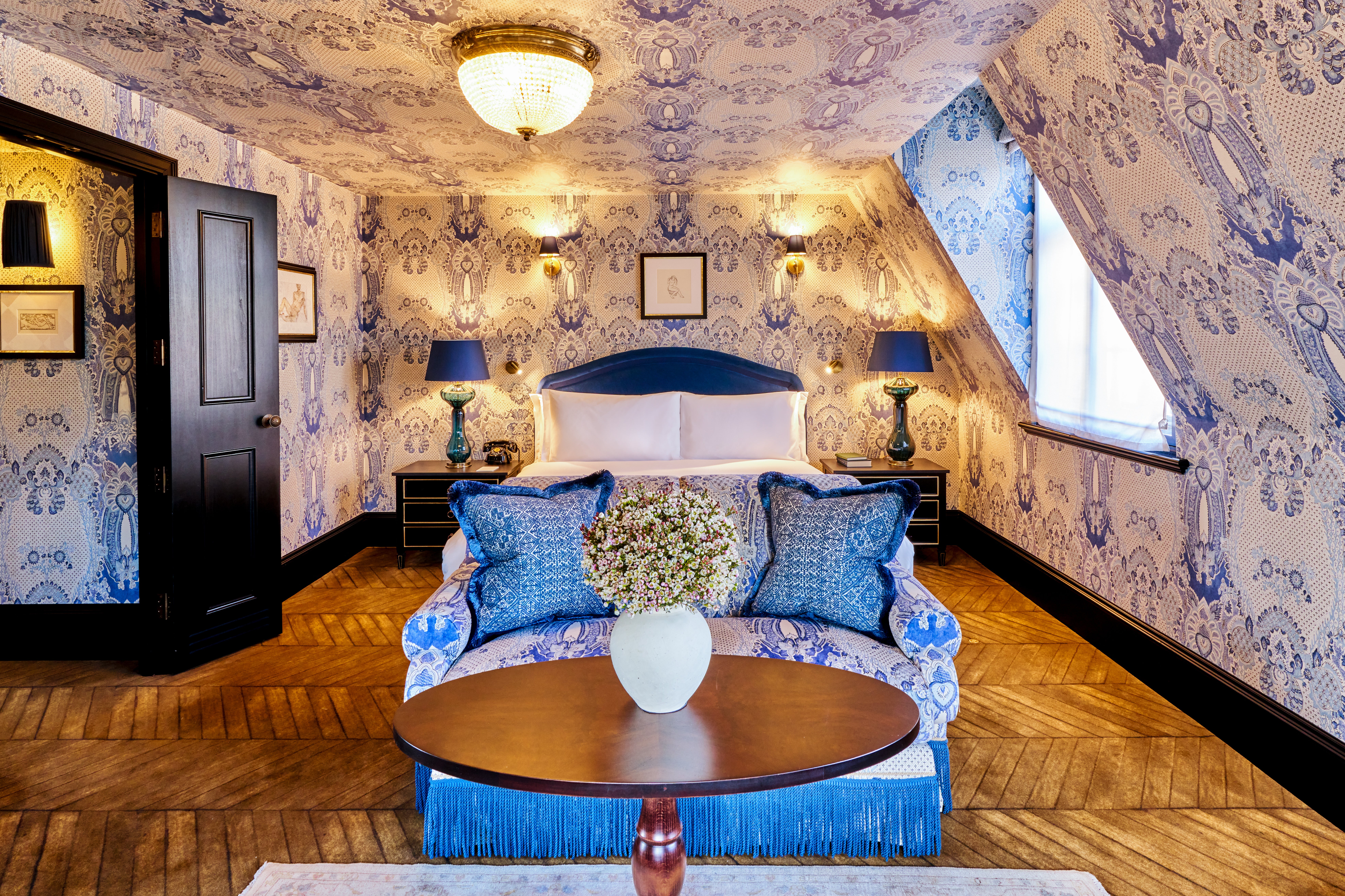 The Artist Suite at The Twenty Two hotel in London is done out in beautiful blue wallpaper