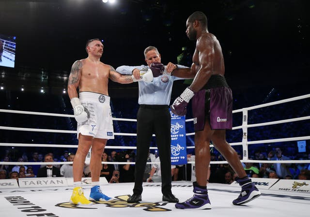 <p>Oleksandr Usyk (left) and Daniel Dubois after a low-blow incident in their first fight</p>