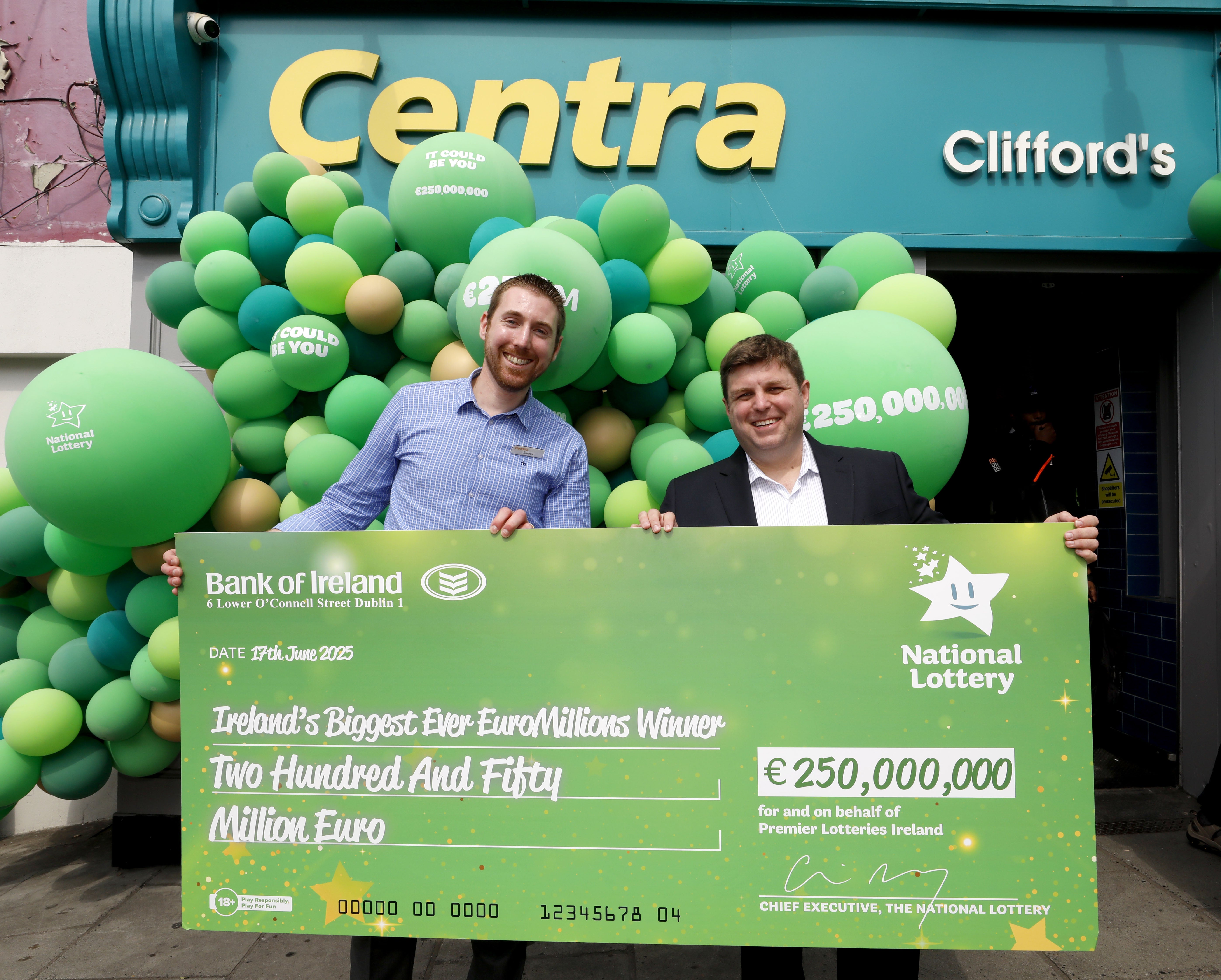 <p>Store manager Simon Champ and Premier Lotteries Ireland chief executive Cian Murphy at Clifford’s Centra in Cork </p>