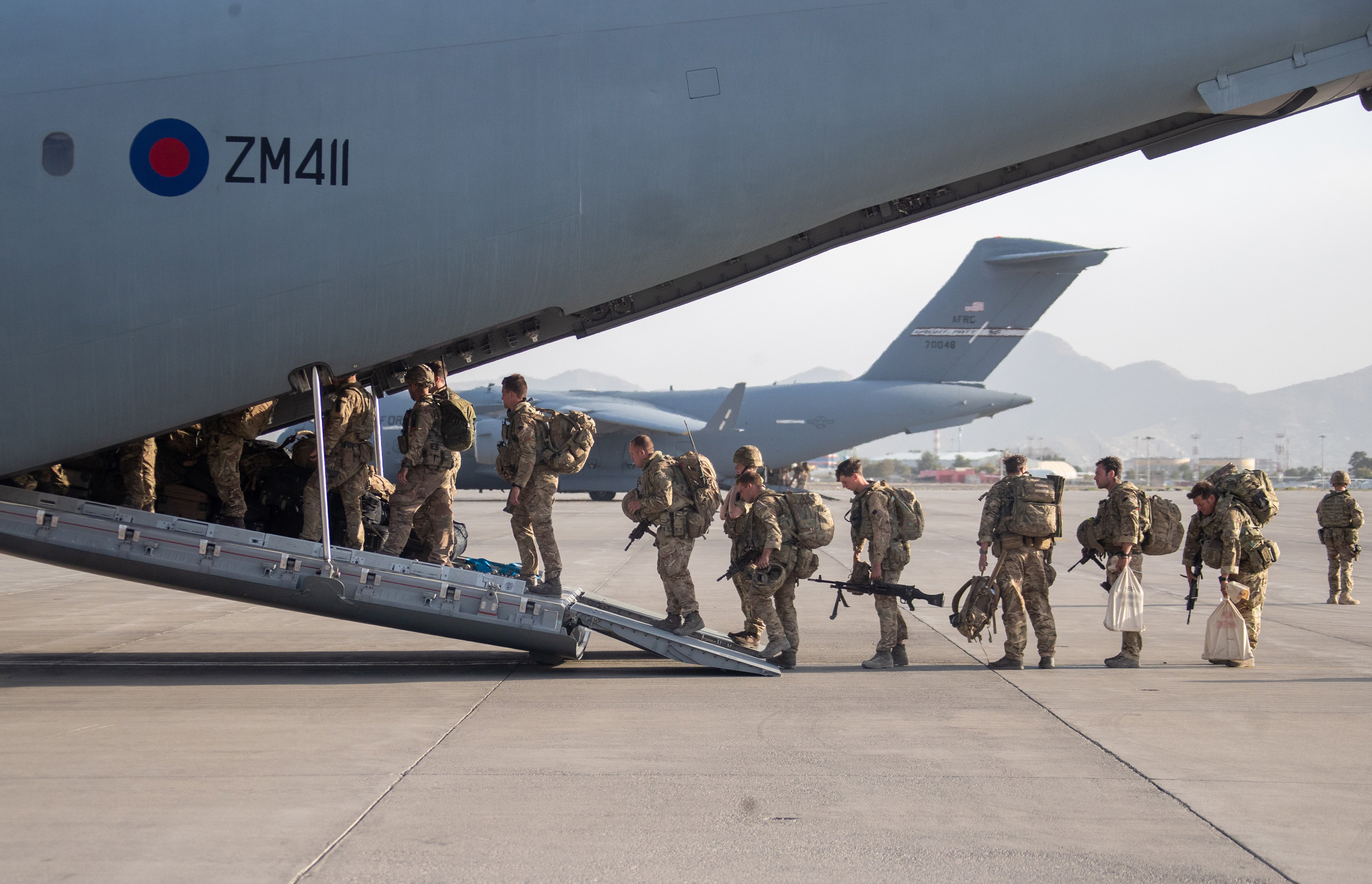 UK military personnel board a A400M aircraft departing from Kabul on 28 August 2021 as part of Operation Pitting.