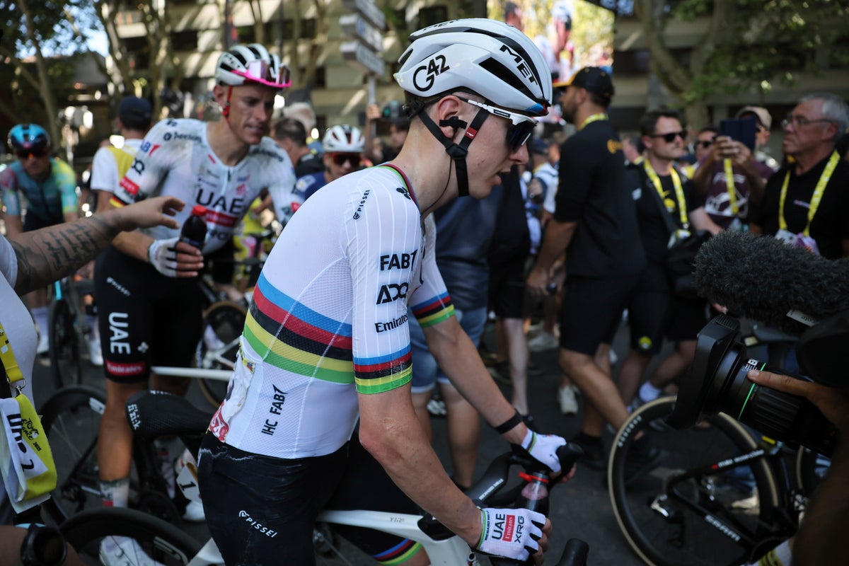 ‘I’m a bit beaten up’: Tadej Pogacar caught out in late crash as Jonas Abrahamsen wins stage 11