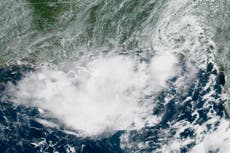 Gulf coast braces for flooding as storm system builds into possible tropical depression