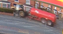 Moment tractor smashes into homes after drug driver runs red light