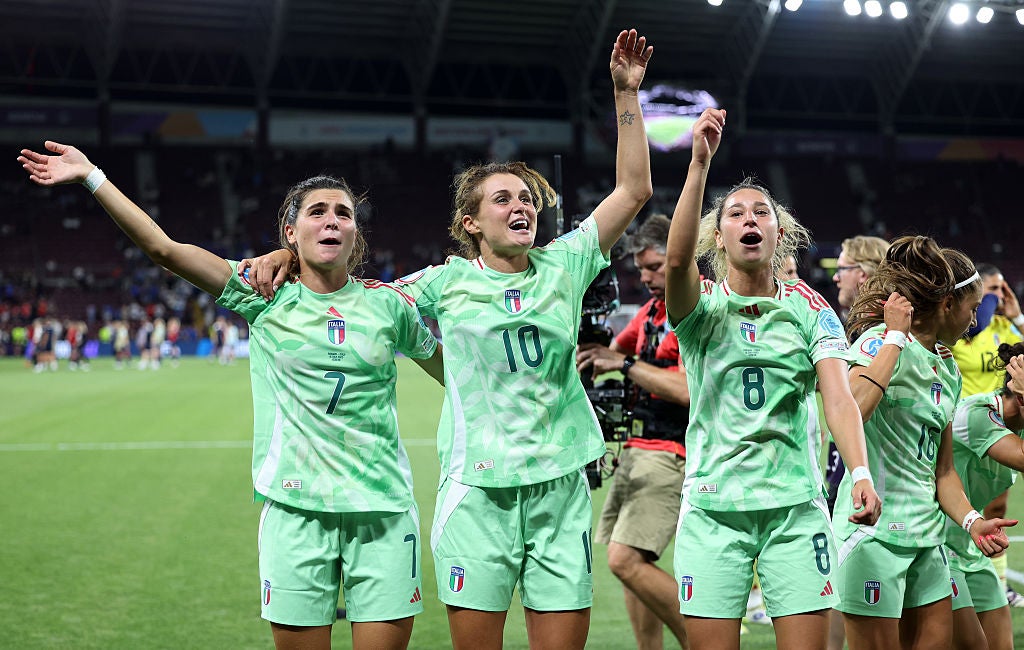 Italy’s players celebrate reaching the semi-finals for the first time since 1997