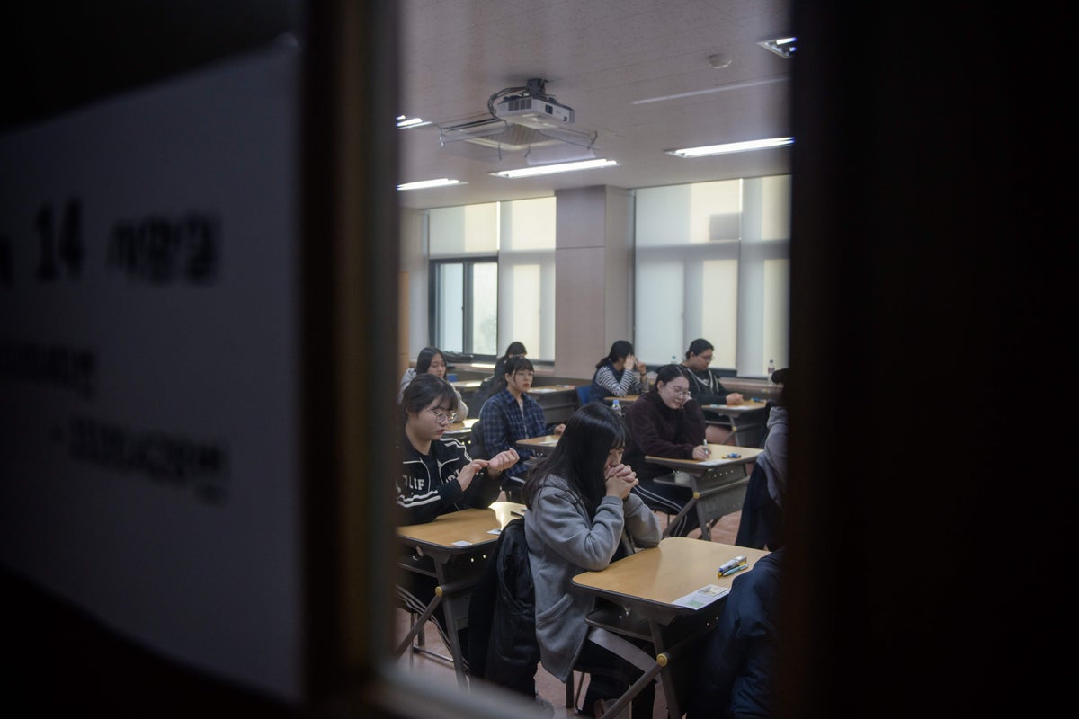 South Korea arrests teacher and parent accused of breaking into school to steal exam papers