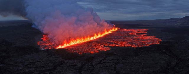 <p>Lava emerges through a fissure following a volcano eruption near Grindavik, Reykjanes, Iceland </p>