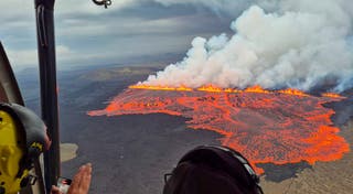 Lava and smoke erupting from a volcano near Grindavik on the Icelandic peninsula of Reykjanes