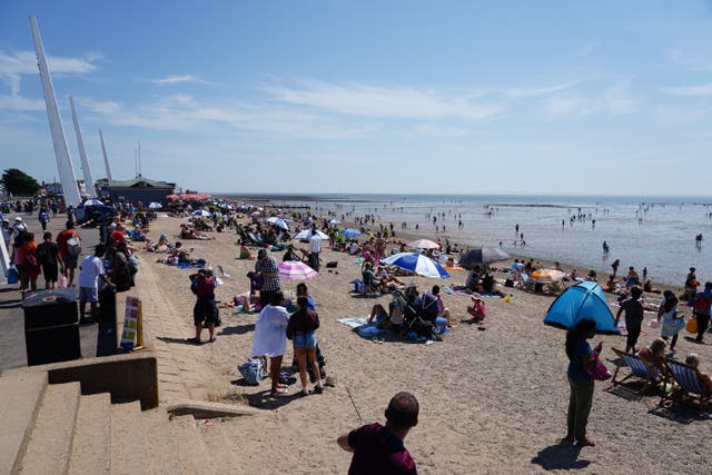 People enjoy the warm weather at Southend-on-Sea (Ian West/PA)