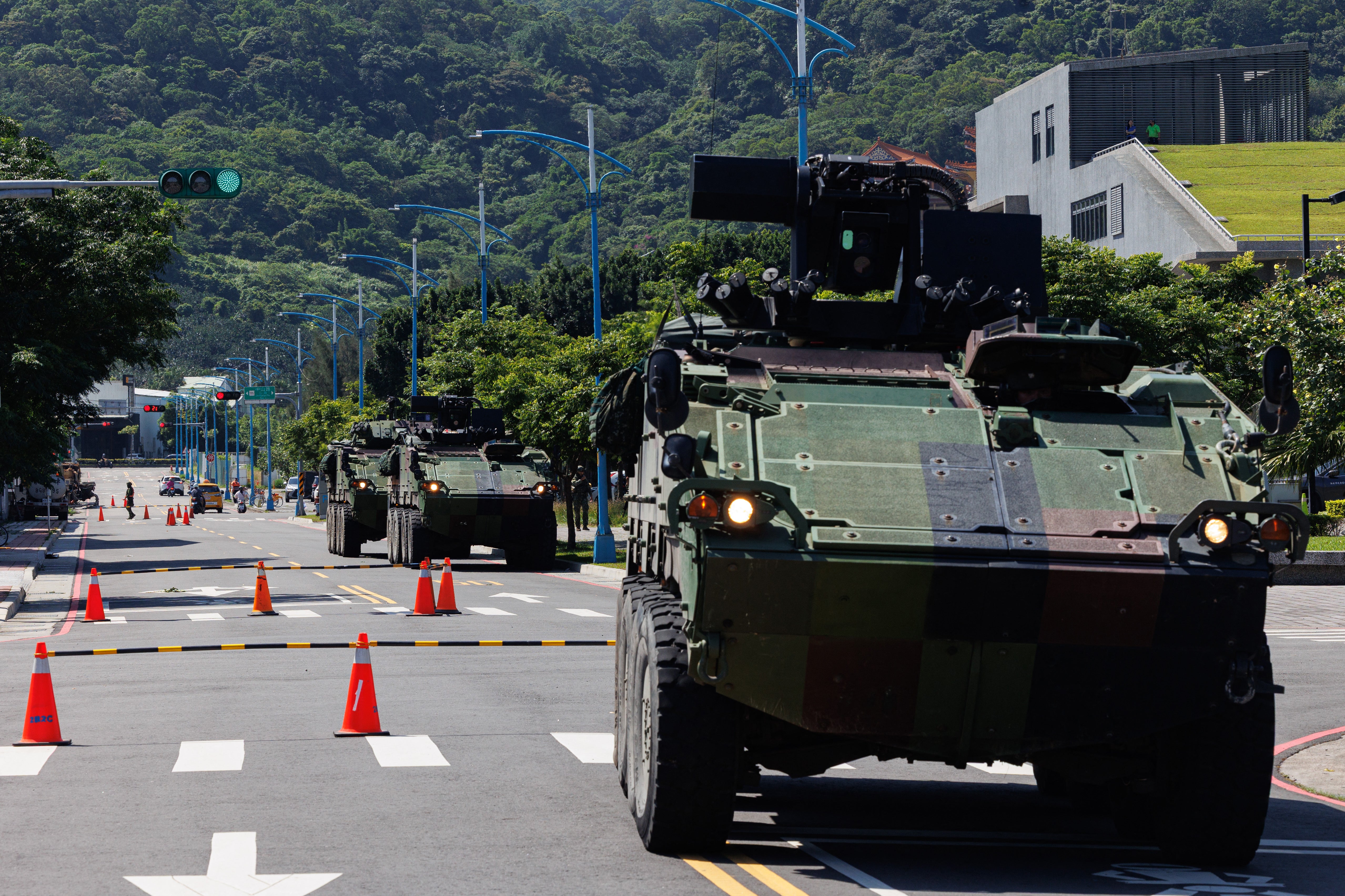 CM-32 Clouded Leopard vehicles, officially Taiwan Infantry Fighting Vehicle (TIFV), are deployed near the Port of Taipei