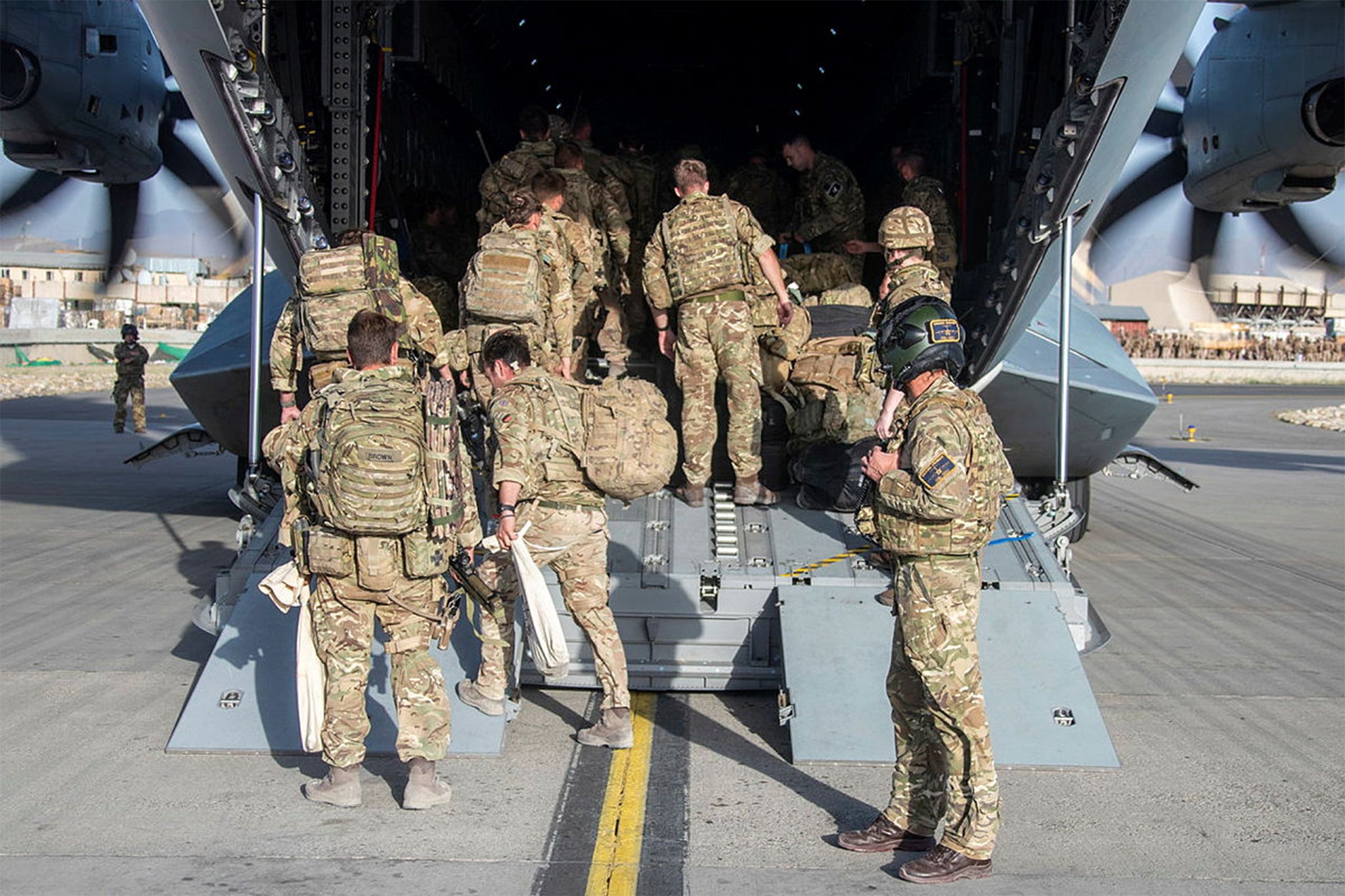 <p>British troops board an A400M aircraft at Kabul airport, Afghanistan, in August 2021</p>