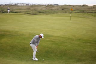 McIlroy struggled off the tee but his iron play was superb as he posted a round of 70