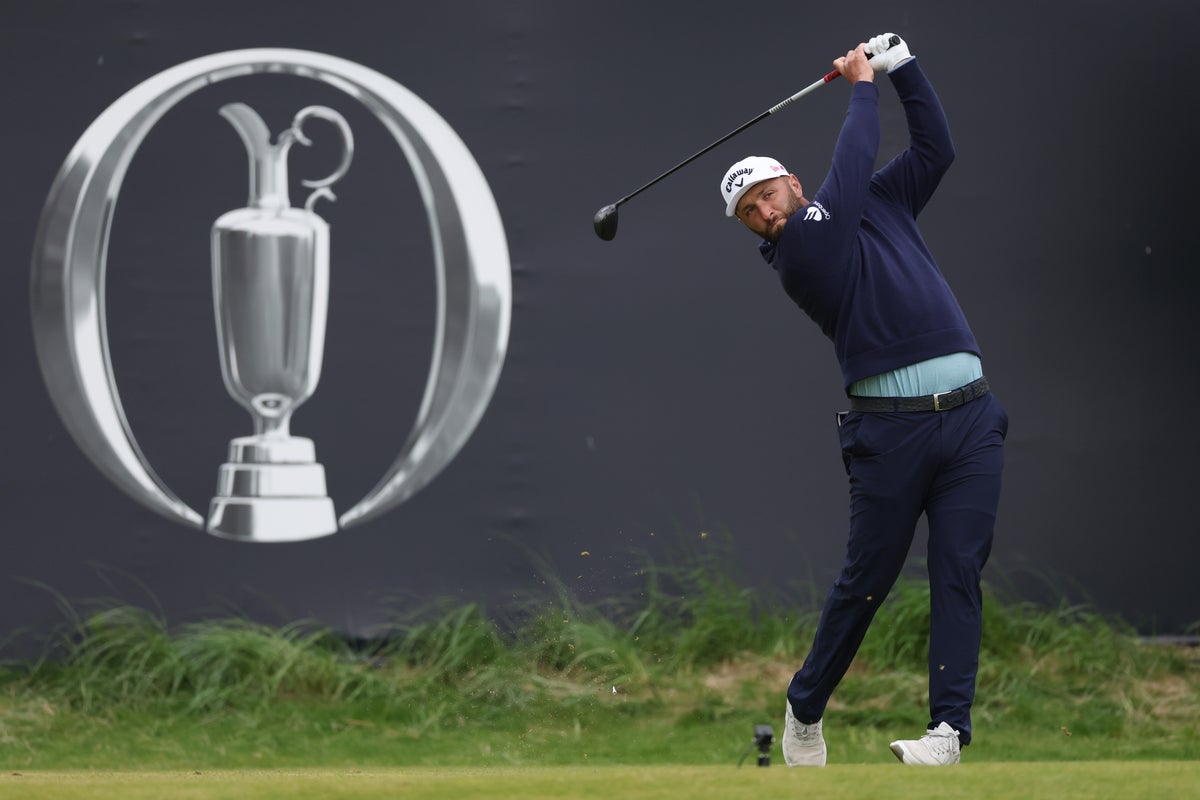 Jon Rahm reacts after Open fan whistles during tee shot