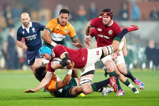 <p>British and Irish Lions' Tadhg Beirne is tackled by AUNZ Invitational XV's Pete Samu</p>