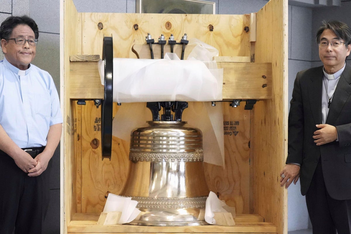 Nagasaki cathedral blesses a bell that replaces one destroyed by the US atomic bomb
