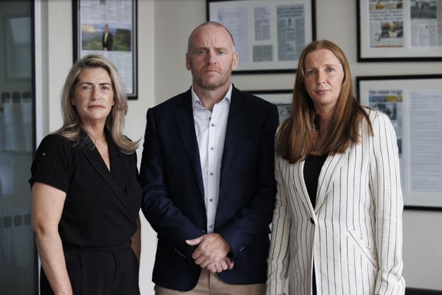 Retired detective sergeant James Brannigan with Katie Simpson’s aunts Paula Mullan (left) and Colleen McConville (right) during the launch of The Katie Trust, in memory of murder victim Katie Simpson, at KRW Law offices in Belfast (McBurney/PA)