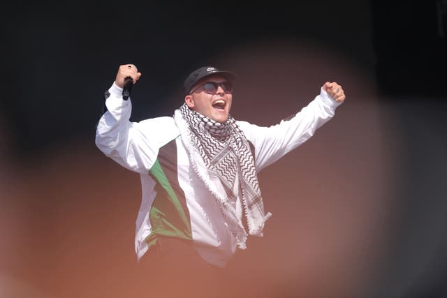 Kneecap performing on the West Holts Stage during the Glastonbury Festival at Worthy Farm (Yui Mok/PA)