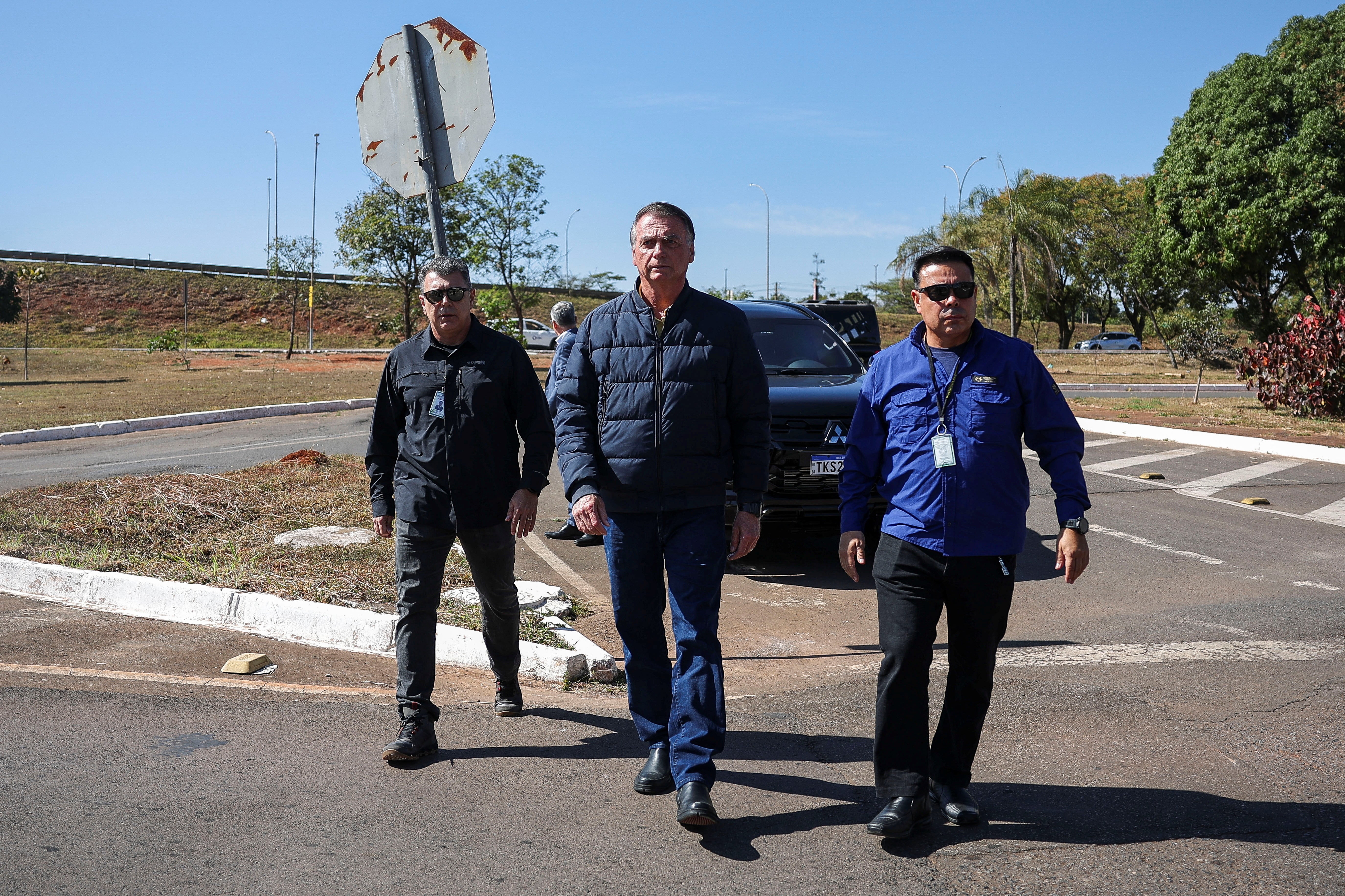 Brazil's former President Jair Bolsonaro arrives to the State Secretariat of Penitentiary Administration headquarters in Brasilia