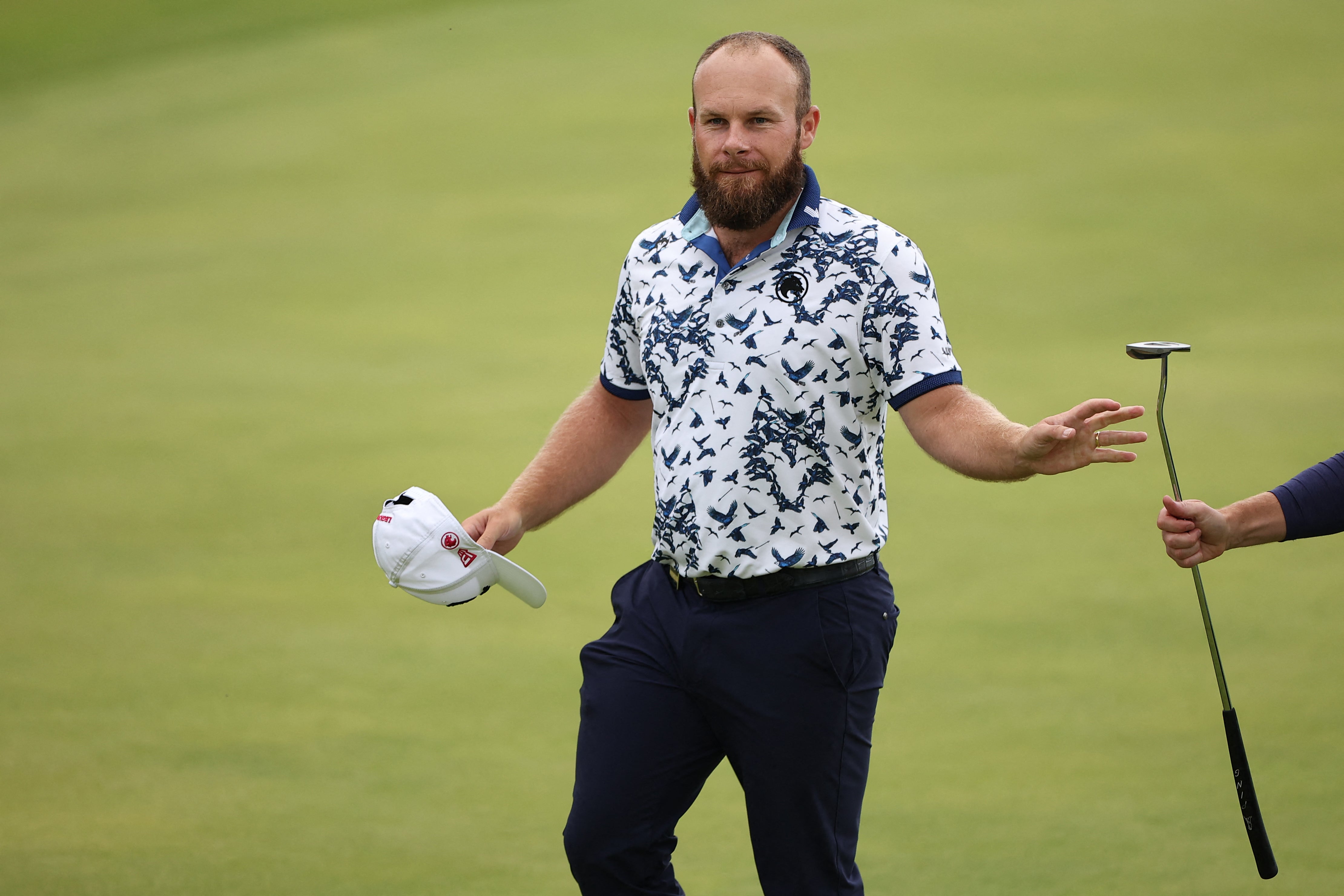 England's Tyrrell Hatton reacts to finishing his second round
