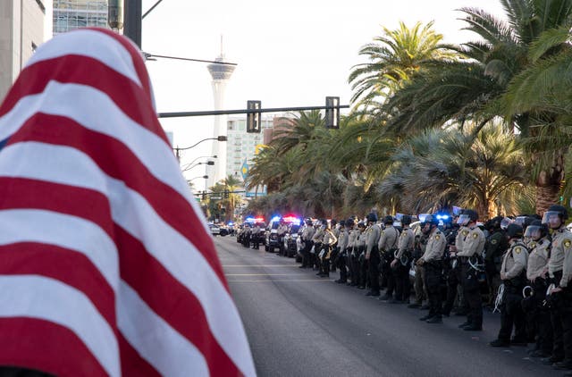 <p>Officers line Las Vegas Boulevard during a 'No Kings' protest on June 14, 2025</p>