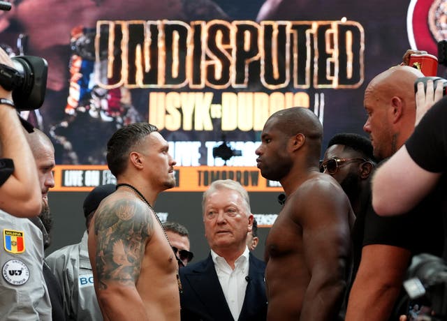 <p>Oleksandr Usyk (left) and Daniel Dubois face off during their weigh-in (Bradley Collyer/PA).</p>