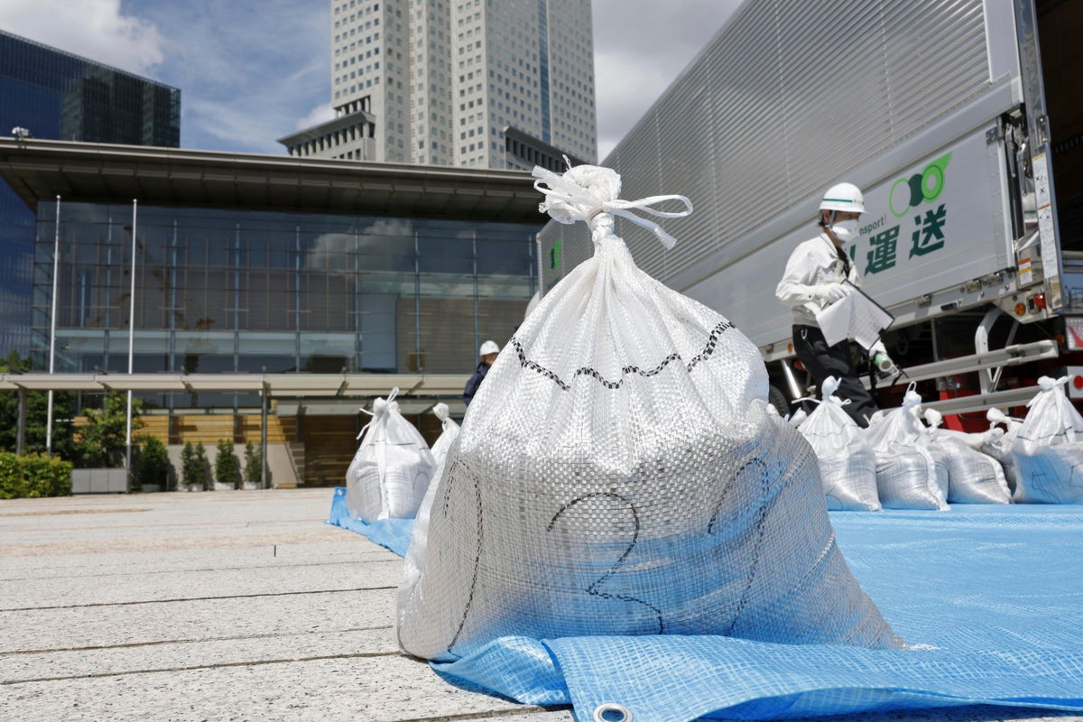 Slightly radioactive Fukushima soil is used at Japanese prime minister's office to prove safety
