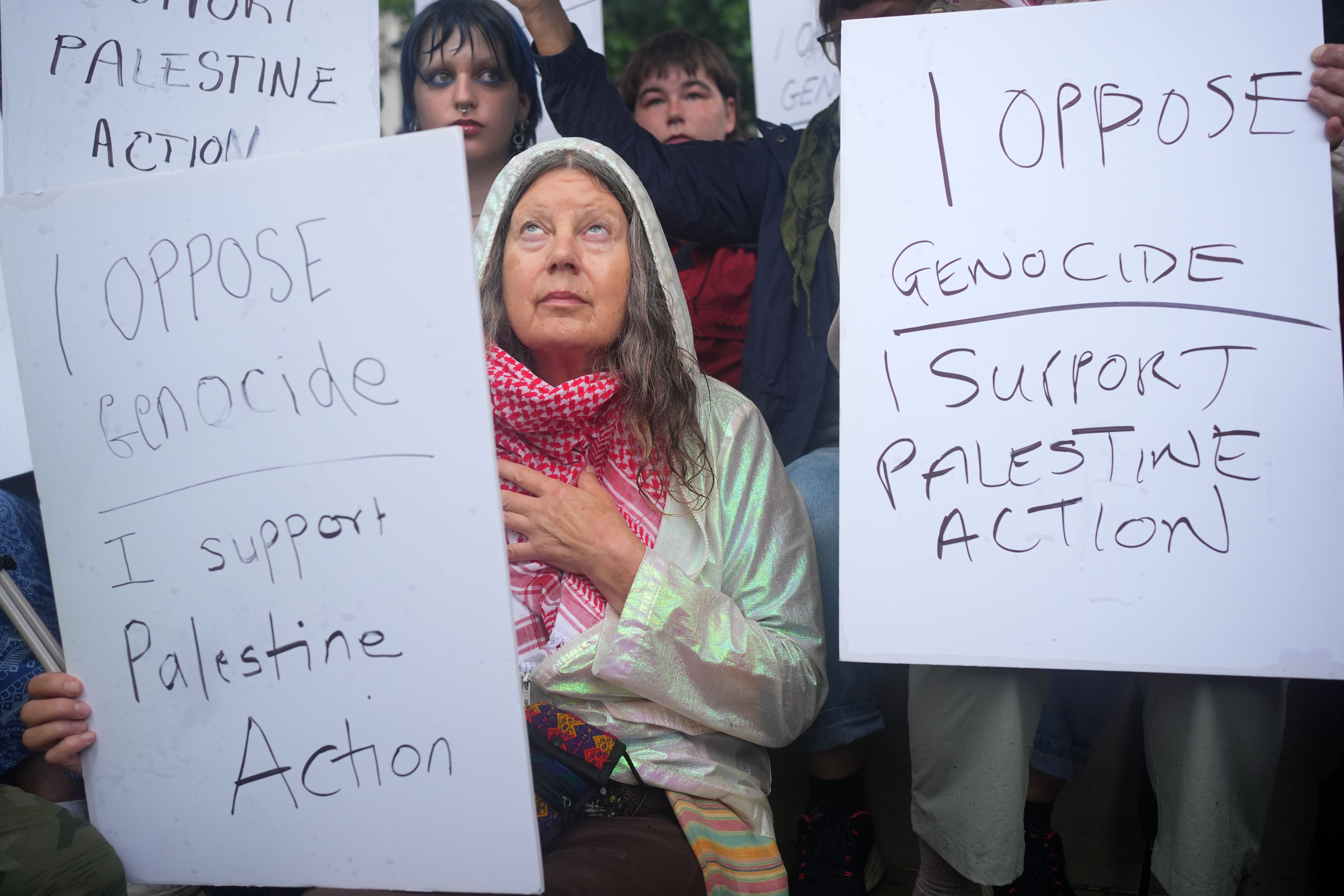 People attend a protest in Parliament Square in support of Palestine Action (Yui Mok/PA)