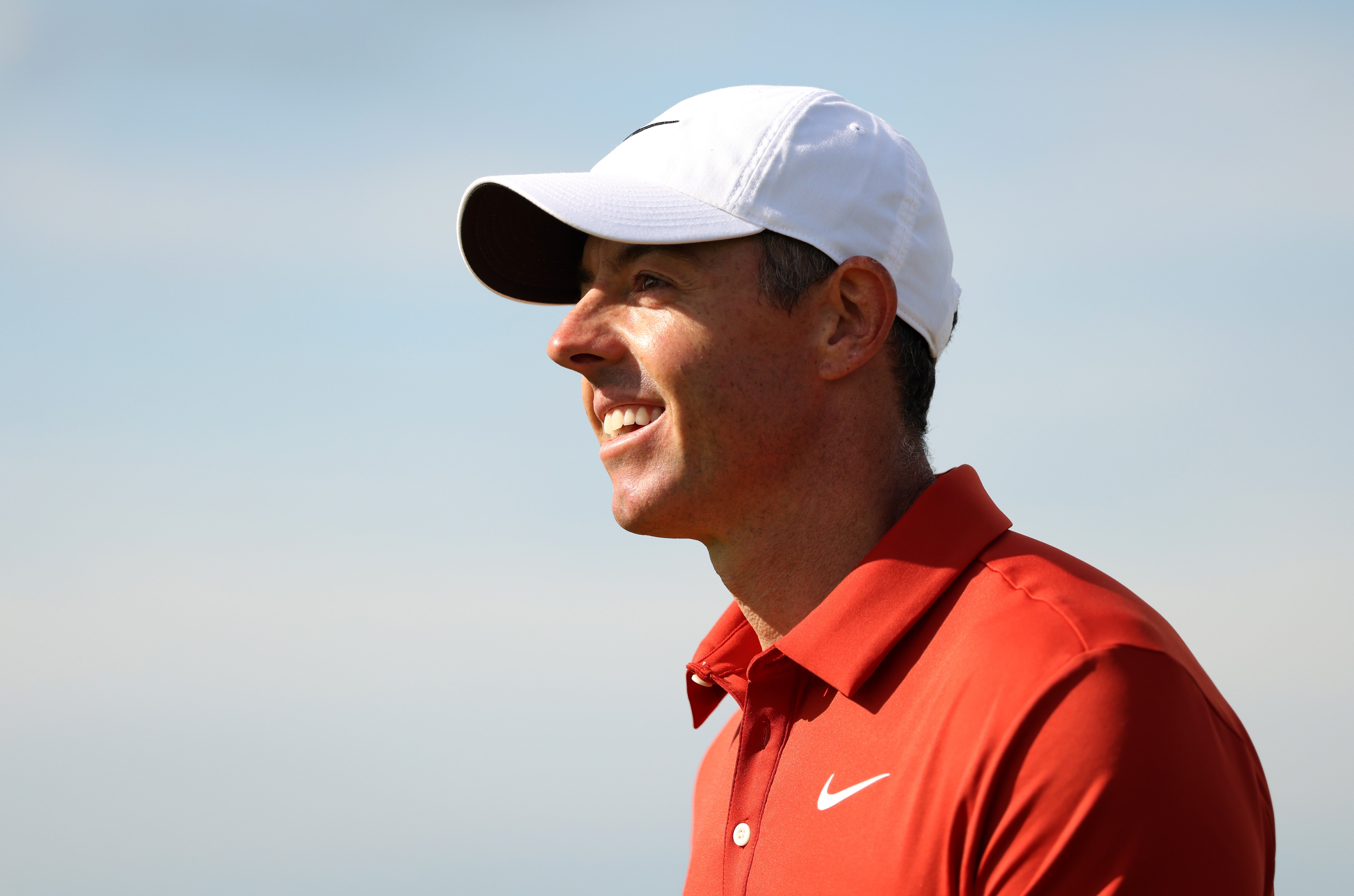 Rory McIlroy of Northern Ireland acknowledges the crowd on the 13th green