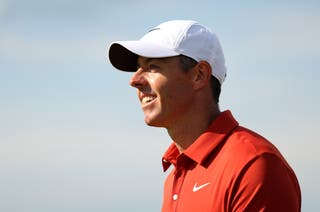 Rory McIlroy of Northern Ireland acknowledges the crowd on the 13th green