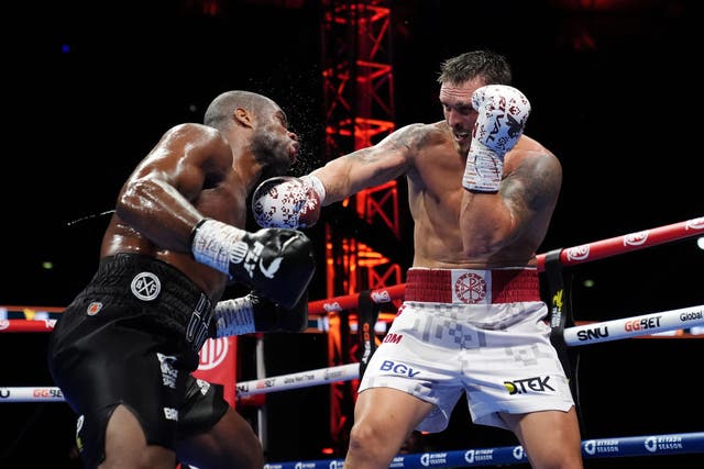 <p>Oleksandr Usyk and Daniel Dubois (left) in action during their IBF, IBO, WBC, WBA and WBO World heavyweight bout (Bradley Collyer/PA)</p>