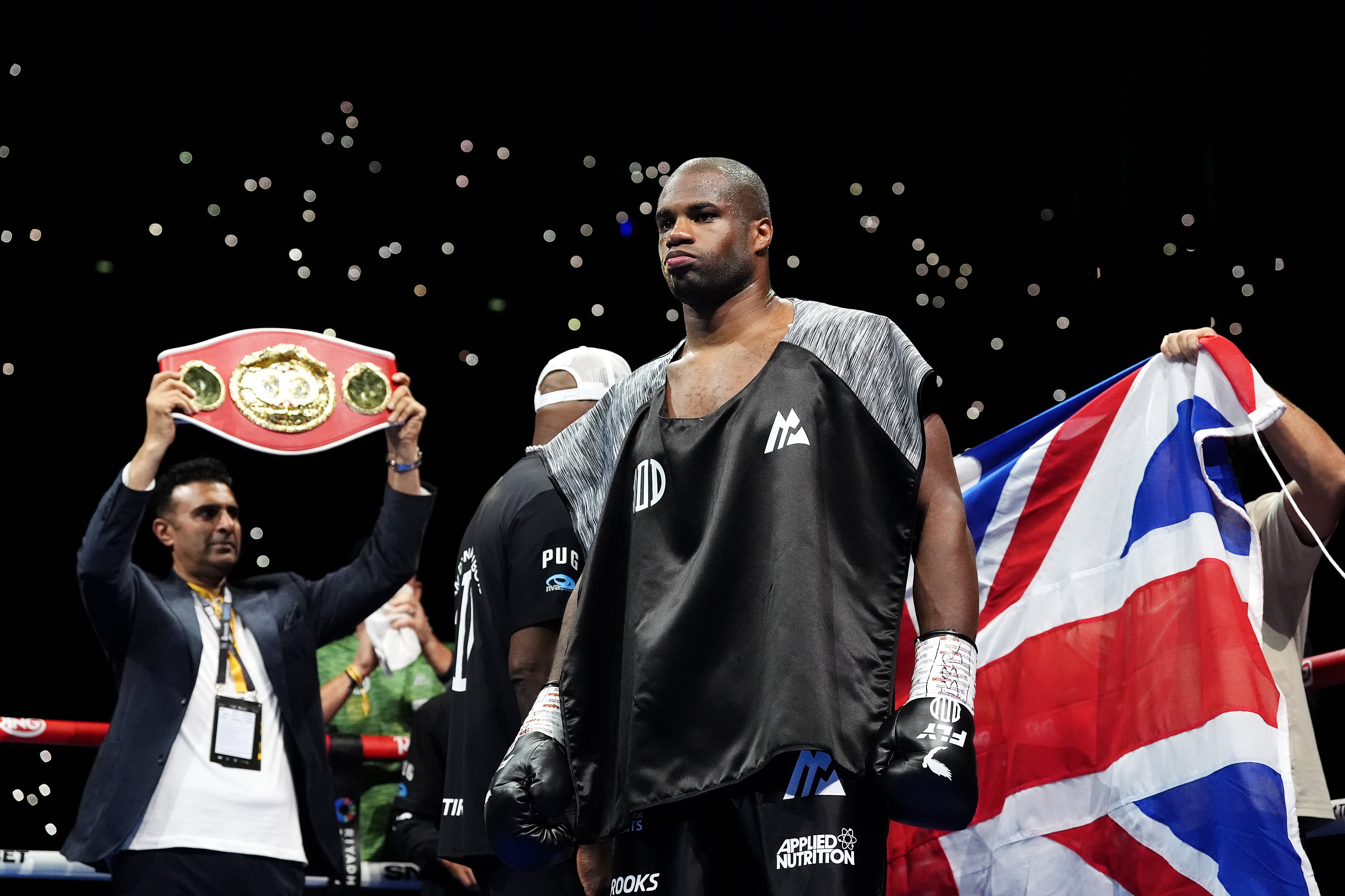 Daniel Dubois walks out for the IBF, IBO, WBC and WBO world heavyweight bout against Oleksandr Usyk at Wembley Stadium (Bradley Collyer/PA)