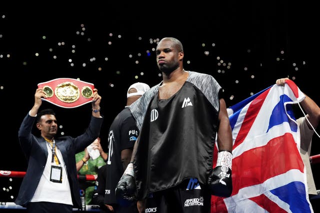 <p>Daniel Dubois walks out for the IBF, IBO, WBC and WBO world heavyweight bout against Oleksandr Usyk at Wembley Stadium (Bradley Collyer/PA)</p>