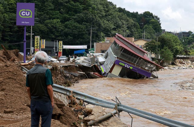 <p>A damaged convenience store building is seen after heavy rains in Gapyeong, South Korea</p>