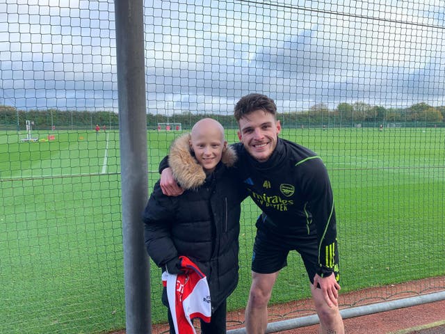 <p>Arsenal fan Jamie, with footballer Declan Rice, played the sport five times a week before his diagnosis</p>
