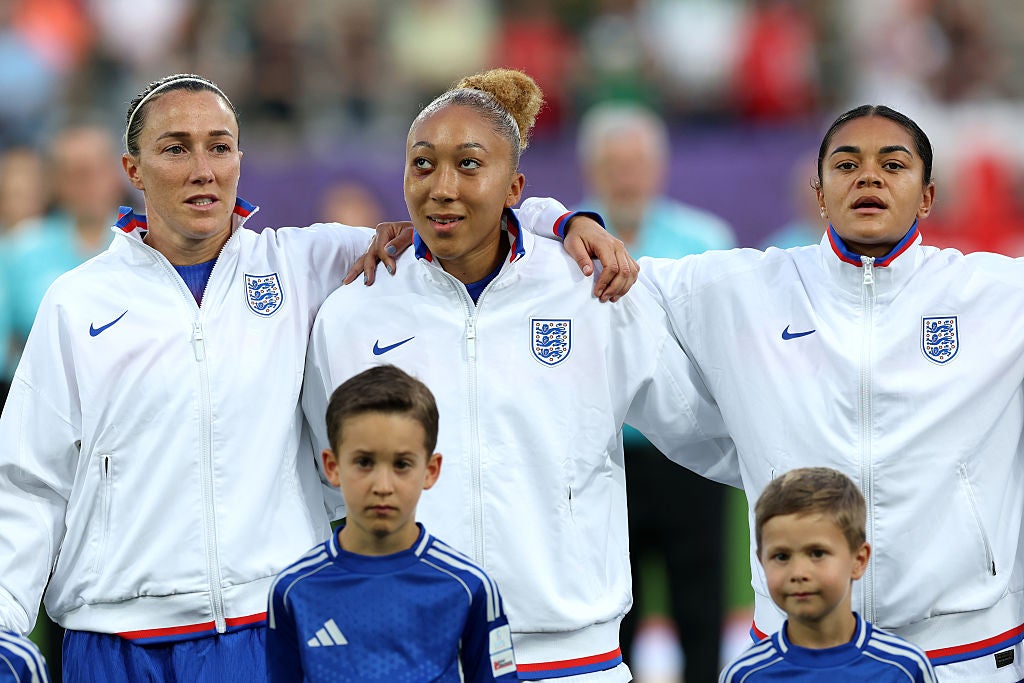 Lucy Bronze with England team-mates Lauren James and Jess Carter